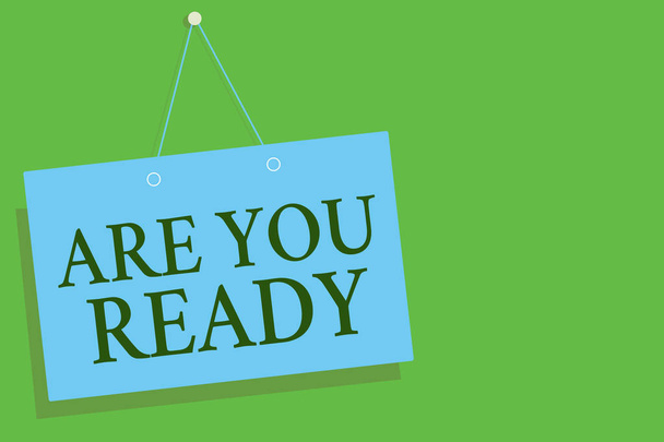 Text sign showing Are You Ready. Conceptual photo Alertness Preparedness Urgency Game Start Hurry Wide awake Blue board wall message communication open close sign green background. - Photo, Image