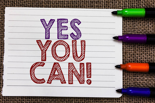 Conceptual hand writing showing Yes You Can. Business photo showcasing Positivity Encouragement Persuade Dare Confidence Uphold Notebook Paper Important reminder Markers Jute background. - Photo, Image