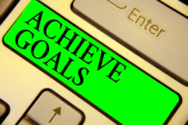 Text sign showing Achieve Goals. Conceptual photo Results oriented Reach Target Effective Planning Succeed Keyboard green key Intention create computer computing reflection document. - Photo, Image