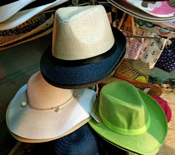 Hats for sale in Greece not far from the sea - Photo, Image