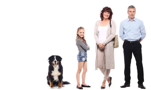 Happy people with dog on white background - Fotoğraf, Görsel