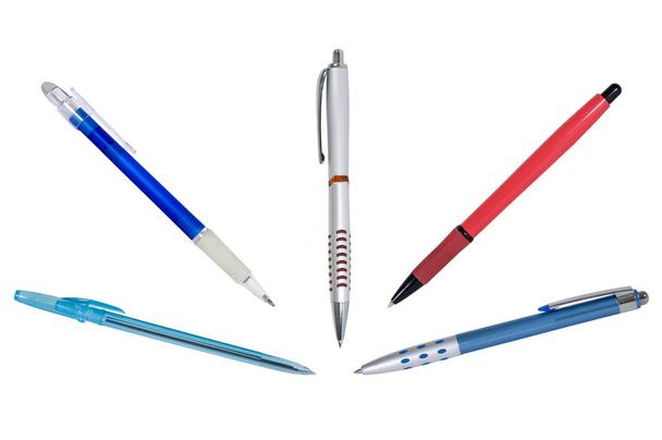 Collection of ballpoint pens on a white background. - Фото, изображение
