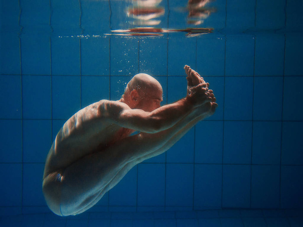 athletic sport man underwater in the swimming pool - Photo, Image