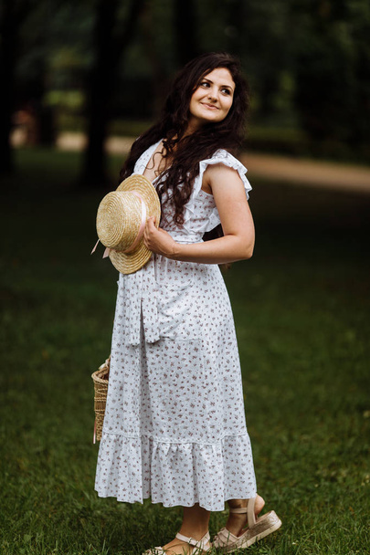 Beautiful young  woman  in summer park  - Fotoğraf, Görsel