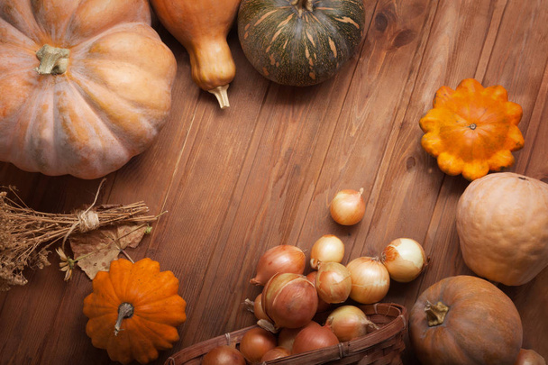 autumn pumpkins, fruits and vegetables on wooden wooden table  - Valokuva, kuva