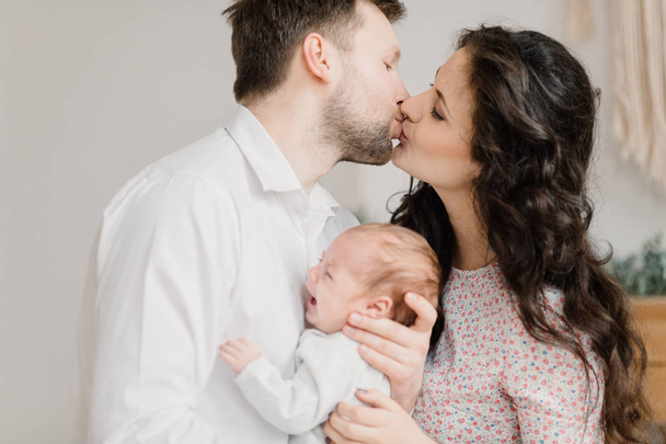 Happy young family with little baby boy - Foto, Imagen