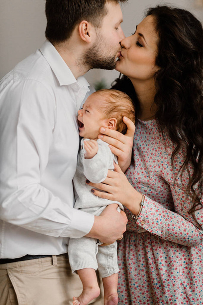 Happy young family with little baby boy - Zdjęcie, obraz