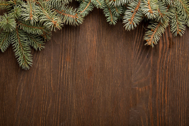 Christmas Tree on dark wooden background  - Zdjęcie, obraz