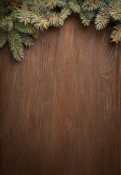Christmas Tree on dark wooden background - Zdjęcie, obraz