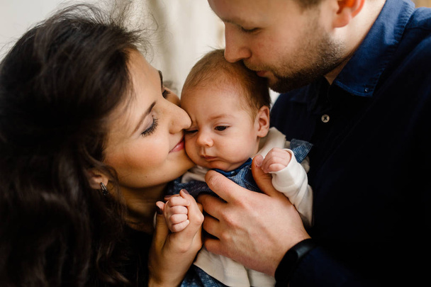 Happy young family with little baby boy - Fotó, kép