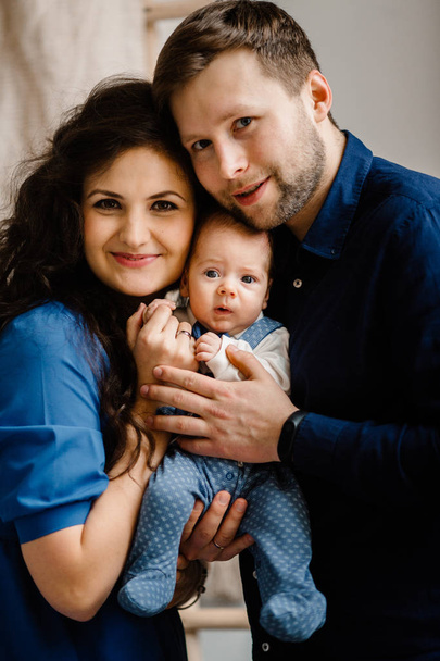Happy young family with little baby boy - Фото, изображение