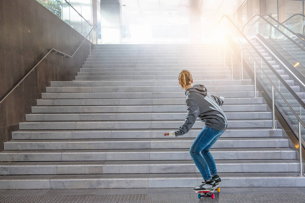 Teenager girl ride her skateboard. Mixed media - Фото, зображення