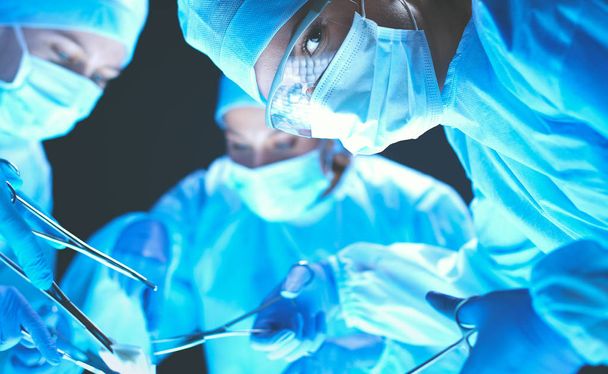 Team surgeon at work on operating in hospital - Fotoğraf, Görsel