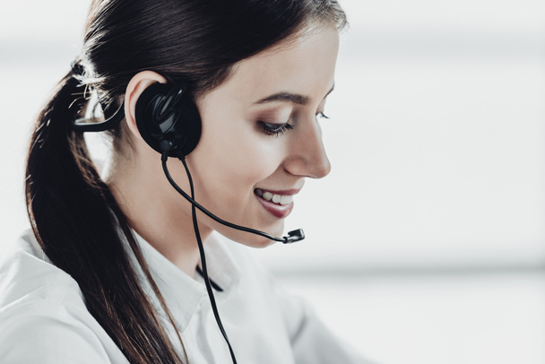 beautiful female call center worker with headphones - Photo, Image