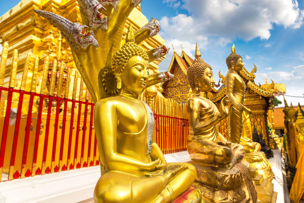 Golden pagoda Wat Phra That Doi Suthep in Chiang Mai, Thailand in a summer day - Photo, image