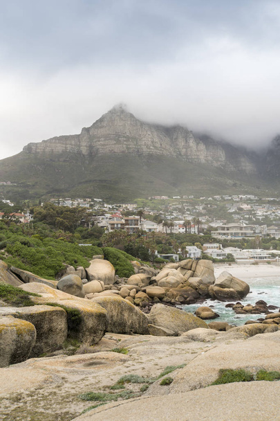 The coastline of Camps Bay, Clifton, Cape Town, South Africa, with the twelve apostle mountains behind it. - Photo, Image