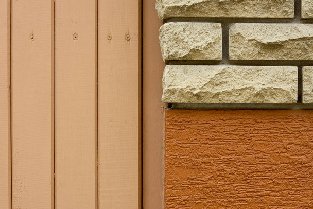 close-up view of bricks, rough wall and wooden planks background  - Photo, Image