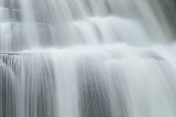 Close up of waterfall useful as a background. - 写真・画像