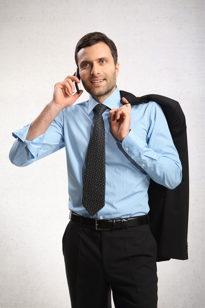 Portrait of young business man using cell phone - Zdjęcie, obraz