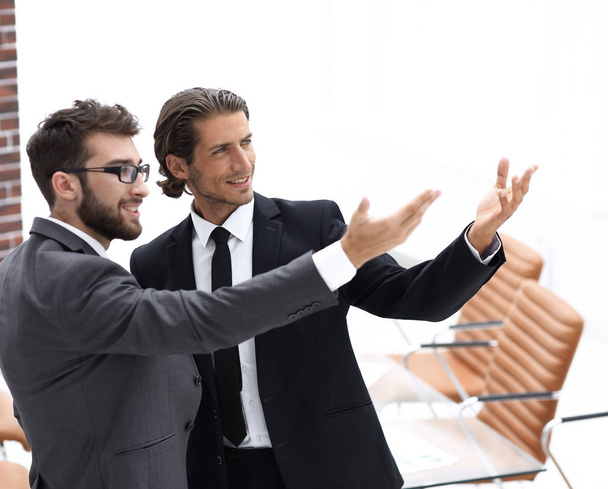 business partners pointing at blank space - Photo, image