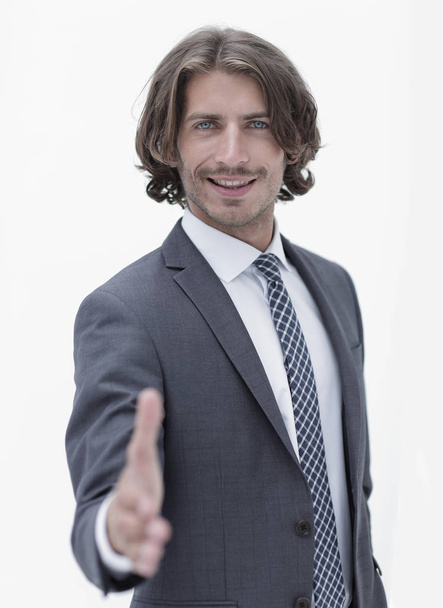 Businessman offering handshake to you on white background - Foto, imagen