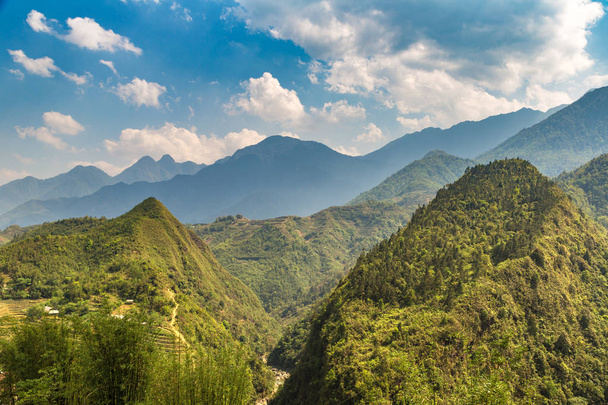 Panoramic view of Terraced rice field in Sapa, Lao Cai, Vietnam in a summer day - Foto, Imagen
