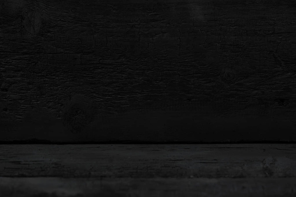 Grunge background. Burned wood texture. Black background - Foto, afbeelding