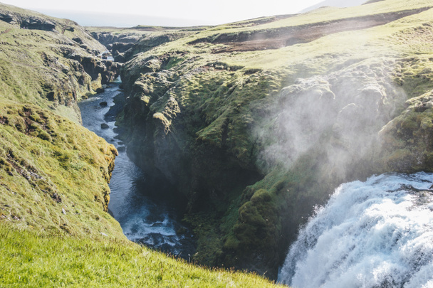 aerial view of waterfall on Skoga river flowing through highlands in Iceland - Foto, Imagem