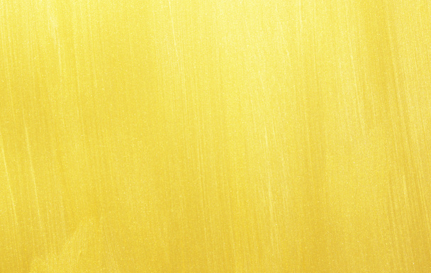Gouden achtergrond of textuur en hellingen schaduw - Foto, afbeelding