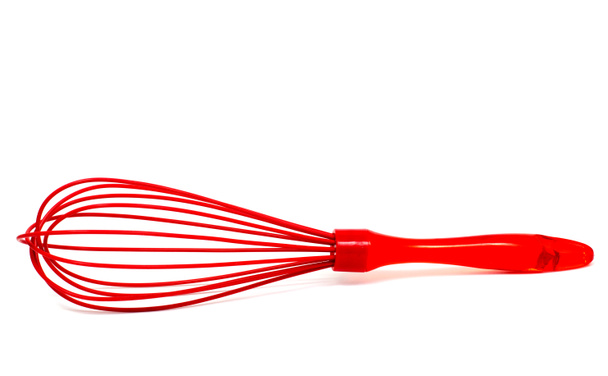  Red plastic kitchen whisk isolated on white background - Photo, Image