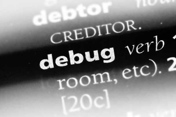 debug word in a dictionary. debug concept - Fotó, kép