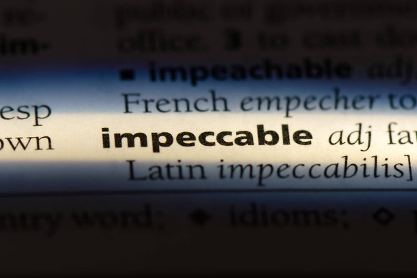 onberispelijke woord in een woordenboek. onberispelijke concept. - Foto, afbeelding