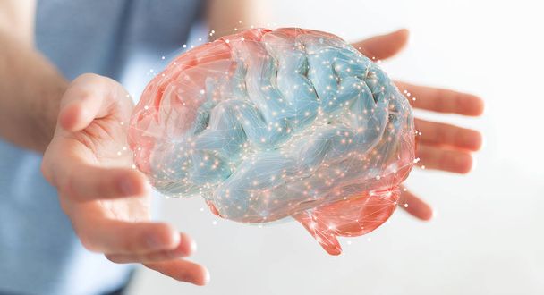 Businessman on blurred background using using digital 3D projection of a human brain 3D rendering - Фото, зображення