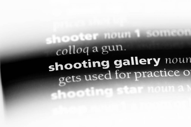 shooting gallery word in a dictionary. shooting gallery concept. - Photo, Image