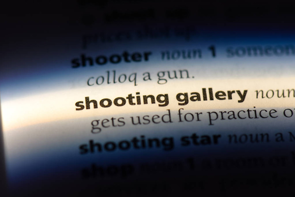 shooting gallery word in a dictionary. shooting gallery concept. - Photo, Image