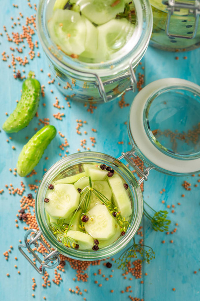Natural and healthy canned cucumber in summer - Foto, Bild
