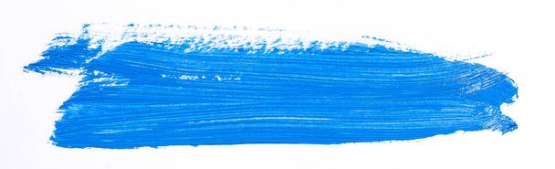 Kék ecsetvonás elszigetelt fehér háttér felett - Fotó, kép