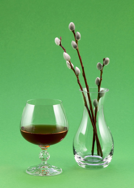 Glass of wine and a transparent vase - Photo, Image