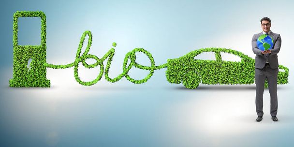 Επιχειρηματίας με αυτοκίνητο που κινούνται με βιοκαύσιμα - Φωτογραφία, εικόνα