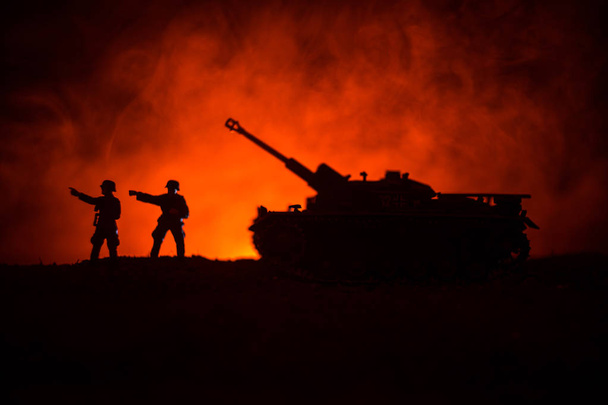 War Concept. Military silhouettes fighting scene on war fog sky background, World War German Tanks Silhouettes Below Cloudy Skyline At night. Attack scene. Armored vehicles. Tanks battle - Photo, Image