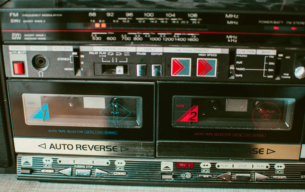 Retro dusty boombox (tape recorder) on a shelf in a garage - Photo, Image