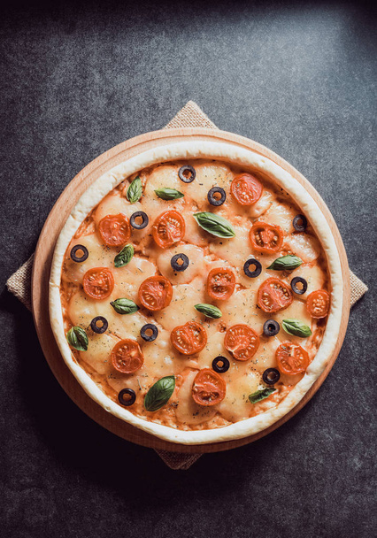 italian pizza at black table background - Valokuva, kuva