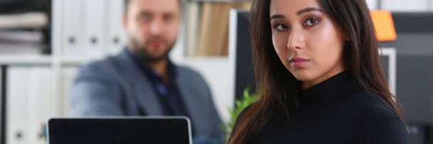 young pretty brunette woman in office hold tablet in hands - Fotografie, Obrázek