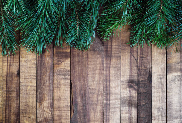 Vintage joulukuusi puulevyt tausta kuusen oksat. Tekstiavaruus. Litteä
. - Valokuva, kuva