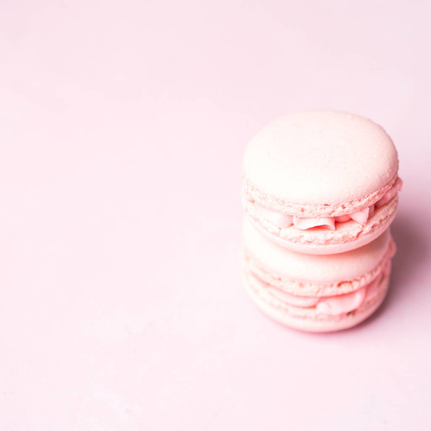 Stack of fresh strawberry macaroons on pink pastel background - Foto, immagini