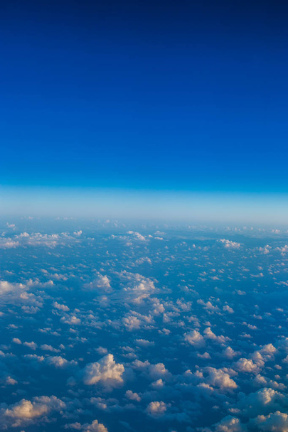 Flying above the clouds. view from the airplane - Foto, Imagem