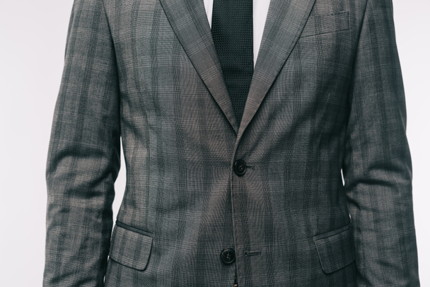 cropped image of businessman standing in jacket isolated on white  - Valokuva, kuva