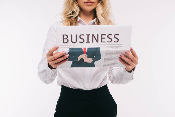 cropped image of businesswoman reading business newspaper isolated on white - Valokuva, kuva