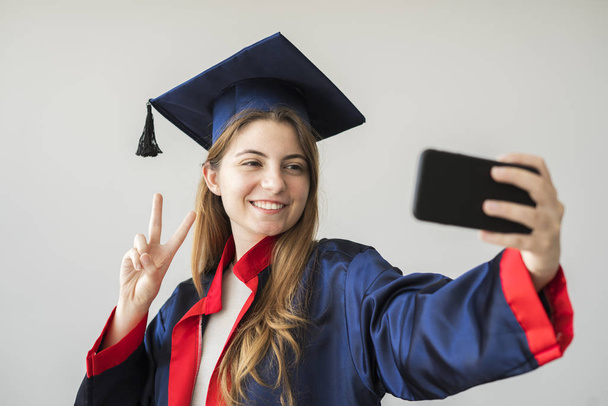 Young female student graduating from university - Photo, Image