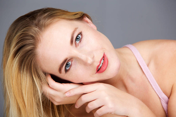 Close up beauty portrait of young blond woman staring - Photo, Image